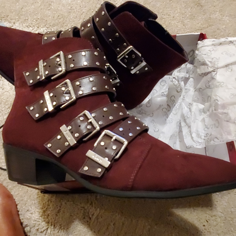 Strapped and studded suede booties